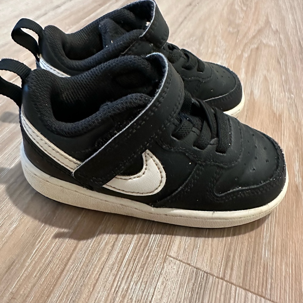 Toddler black Nike shoes